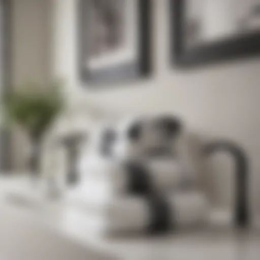 Elegant arrangement of white towels with black stripes on a bathroom countertop