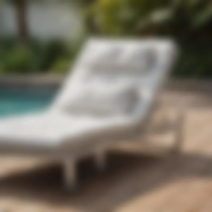 Close-up of a thick-cushioned outdoor chaise lounge showcasing quality materials and design